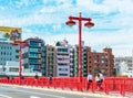 TOKYO, JAPAN - OCTOBER 31, 2017: View of the red bridge in the center of the city. Copy space for text. Royalty Free Stock Photo