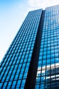 TOKYO, JAPAN - OCTOBER 31, 2017: View of a tall building in the center of the city`. Bottom view. Copy space for text Royalty Free Stock Photo