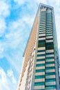 TOKYO, JAPAN - OCTOBER 31, 2017: View of a tall building in the center of the city. Vertical. Bottom view. Copy space for text. Royalty Free Stock Photo