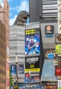 Godzilla statue of Kabukicho and poster of Japanese anime movie City Hunter aka Nicky Larson.