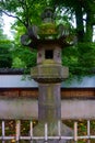 Old stone lanterns of shintoism shrine in Tokyo Japan