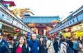 TOKYO, JAPAN: Tourists are spending their time in Nakamise-Dori, a shopping street at Senso-ji temple area located Royalty Free Stock Photo