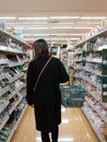 Tokyo, Japan - 19.11.19: A young Japanese lady grocery shopping