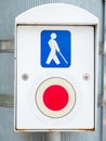 Tokyo, JapanTraffic light button for pedestrians and handicapped persons / Symbol for disabled person for crossing the road at the Royalty Free Stock Photo