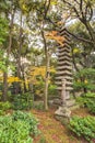 Tokyo Metropolitan Park KyuFurukawa japanese garden`s ruins of a giant thirteen storied stone pagoda Kuyoto