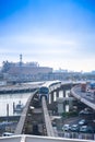 Tokyo Monorail Train Line is Is Approaching Station On A Sunny Day, the terminal is Haneda International airport. Royalty Free Stock Photo