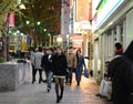 TOKYO - NOVEMBER 23: People visit street life in Shinjuku Royalty Free Stock Photo