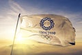 Tokyo 2020 Olympics logo flag textile cloth fabric waving on the top sunrise mist fog