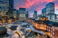 Tokyo railway station and Tokyo highrise building at twilight time in Tokyo, Japan Royalty Free Stock Photo