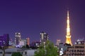 Tokyo Tower at night with tall buildings as seen from Roppongi, Tokyo Royalty Free Stock Photo