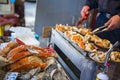 Tokyo, Tsukiji Japan - February 20, 2016 : grill scallops on the