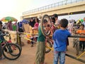 Tol Cibitung Cilincing, Bekasi, Indonesia - People's who are lifting bicycles, passing the road divider portal