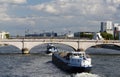 The Tolbiac bridge , Seine river and barges, Paris, France Royalty Free Stock Photo