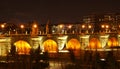 The Toledo bridge illuminated at night.