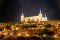 Toledo downtown lights with Alcazar castle on top