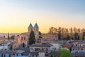 Toledo Skyline at sunset with Puerta de Bisagra Nueva Gate - Toledo, Spain