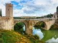 The Puente de Alcantara is a Roman arch bridge in Toledo, Spain, spanning the Tagus River Royalty Free Stock Photo