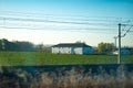 Toledo, Spain, March 27, 2019. Horizontal view from the windows of a train traveling to Toledo, shows a house on a farm on the