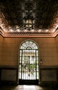 Forged metal door and carved wood ceiling of Typical house in Toledo