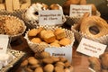 Different types of delicious cakes and cookies made by nuns in pastry shop showcase