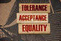 Tolerance acceptance equality words written on wooden blocks. Equal rights social concept