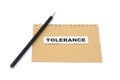 Tolerance text on craft paper on a white background.Equality, diversity and tolerance social concept. LGBT Royalty Free Stock Photo