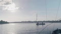 TOLIATTI, RUSSIA. CIRCA JULY 2017. Distance view of two yachts on water of river