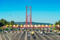 Toll station at the entrance to the 25th April Bridge between Lisbon and Almada, Portugal. Cars passing through pay station