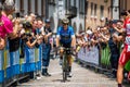 Tolmezzo, Italy May 20, 2018: Esteban Chavez, Mitchelton-Scott Team, in blue jersey smiles at the crowd, by going to the podium s