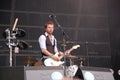 Tom Barman singing and playing live with the Deus band at Pohoda Festival, Trencin, Slovakia - July 8, 2011