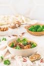 Tom Kha Gai soup with various vegetables and roasted chicken or soy-based meat substitutes Royalty Free Stock Photo