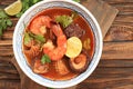 Tom Yam Kung, Prawn and Lemon Red Soup with Squid and Mushrooms Royalty Free Stock Photo