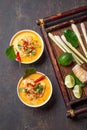 Tom Yam Kung ,Prawn and lemon soup with mushrooms, thai food in two white bowl top view Royalty Free Stock Photo