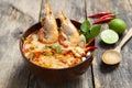 Tom Yam Kung ,Prawn and lemon soup with mushrooms, thai food in wooden bowl top view Royalty Free Stock Photo