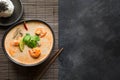 Tom yam kung spicy thai soup with shrimp, seafood, coconut milk and chili pepper. Copy space