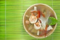 Tom yum goong homemade thai style food with wooden kitchenware Royalty Free Stock Photo