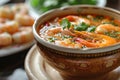 Tom Yum Goong: Spicy shrimp soup with lemongrass, chili, and a citrusy kick, served steaming hot Royalty Free Stock Photo