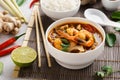 Tom Yum Goong spicy Thai soup with prawns and mushrooms