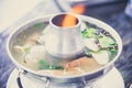 Tom Yum Koong has shimp, mushroom boil with Thai herb is the famous and tasty Thai food