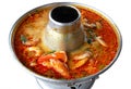 Tom Yum Kung or Prawn spicy soup, Thai famous traditional Sea food soup served in hot pot. Tom Yam is a spicy and sour soup that