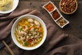 Tom Yum noodle soup ,Egg noodles with Minced Pork and meatball.popular hot and spicy soup in Thailand.Top view Royalty Free Stock Photo