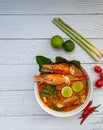 Tom yum soup. Tom yam kung is a thai spicy soup with shrimps, lemongrass,lime, ginger, galangal and coconut milk. Space for text Royalty Free Stock Photo