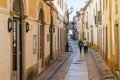 Couple walking narrow medieval streets in Tomar, Ribatejo, Por