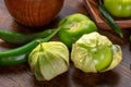 Tomatillos, green tomatoes, and chili peppers. Mexican cuisine ingredients Royalty Free Stock Photo