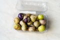 Tomatillos, green tomatoes, with salsa verde, green sauce, in a molcajete, traditional Mexican mortar Royalty Free Stock Photo