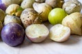 Tomatillos, green tomatoes, with salsa verde, green sauce, in a molcajete, traditional Mexican mortar Royalty Free Stock Photo