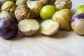 Tomatillos, green tomatoes, with salsa verde, green sauce, in a molcajete, traditional Mexican mortar Royalty Free Stock Photo