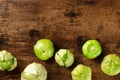 Tomatillos, green tomatoes, top shot with copy space. Mexican food Royalty Free Stock Photo