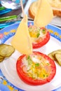 Tomato as sailing boat stuffed with quail egg Royalty Free Stock Photo