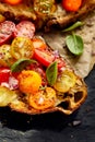 Tomato bruschetta with cheese and herbs, close up Royalty Free Stock Photo